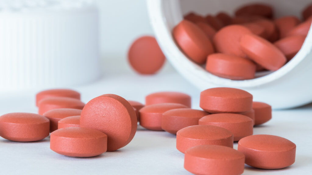 Close up of bottle of ibuprofen that begs the question: is taking ibuprofen everyday bad for you?