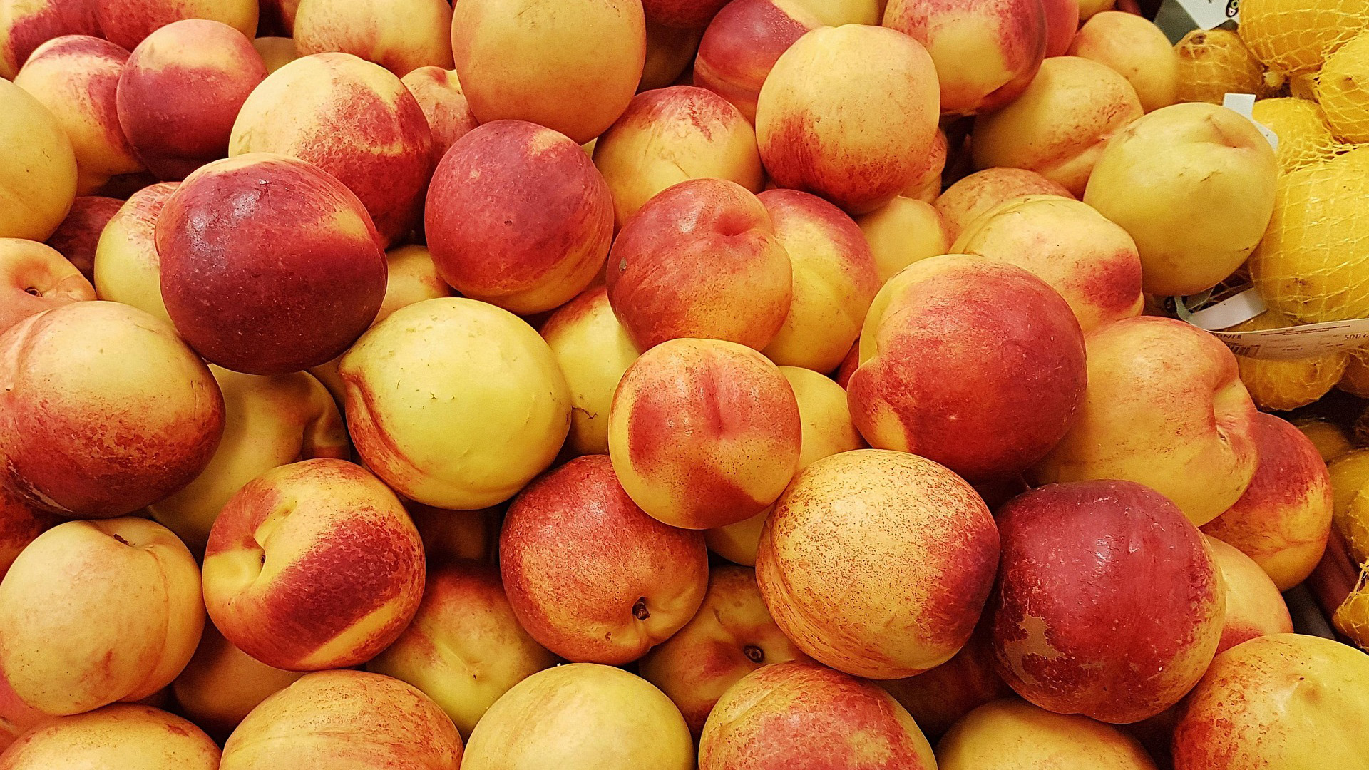 An abundance of organic peaches, illustrating an example of organic food.